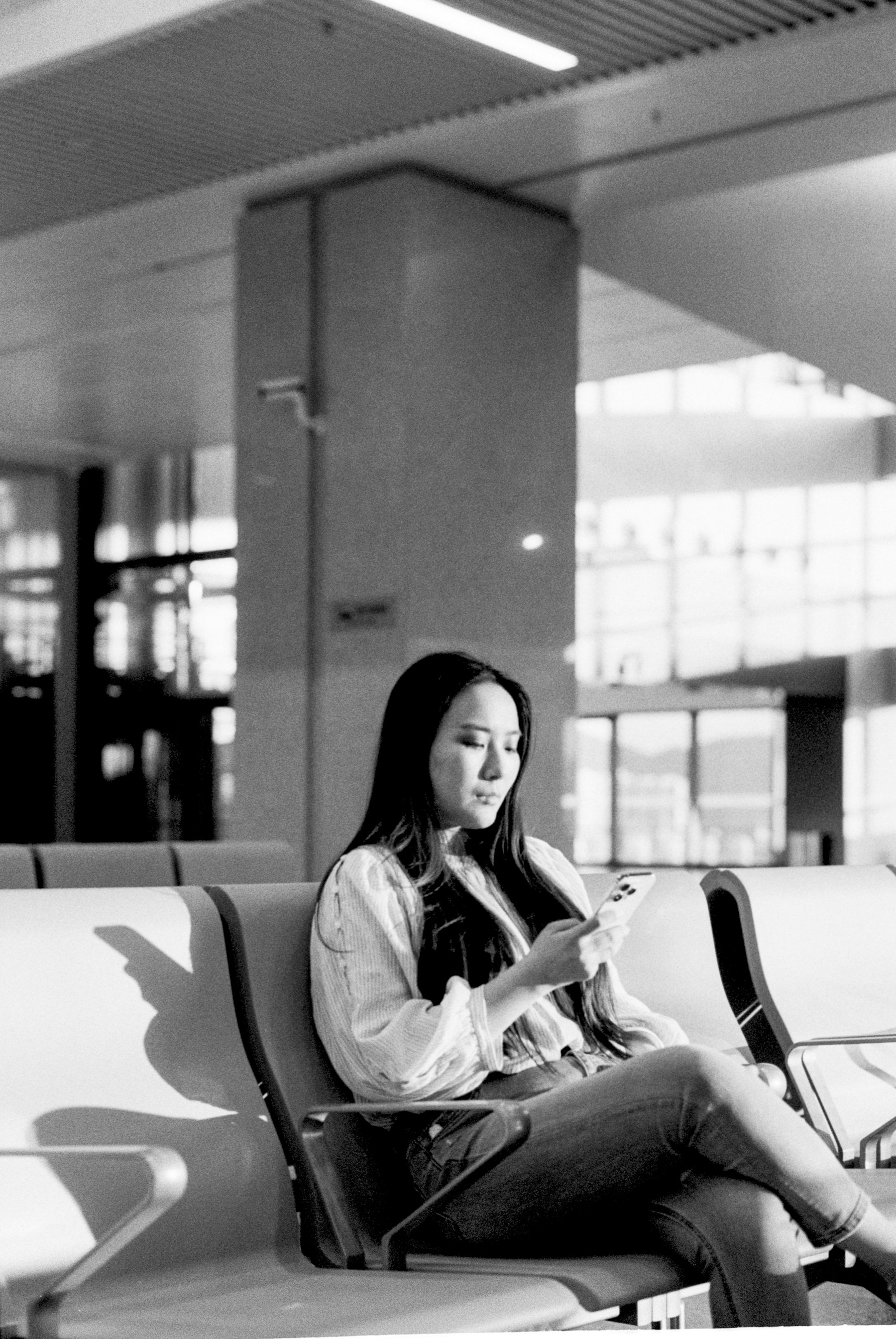 A person using a phone during a preliminary planning conversation