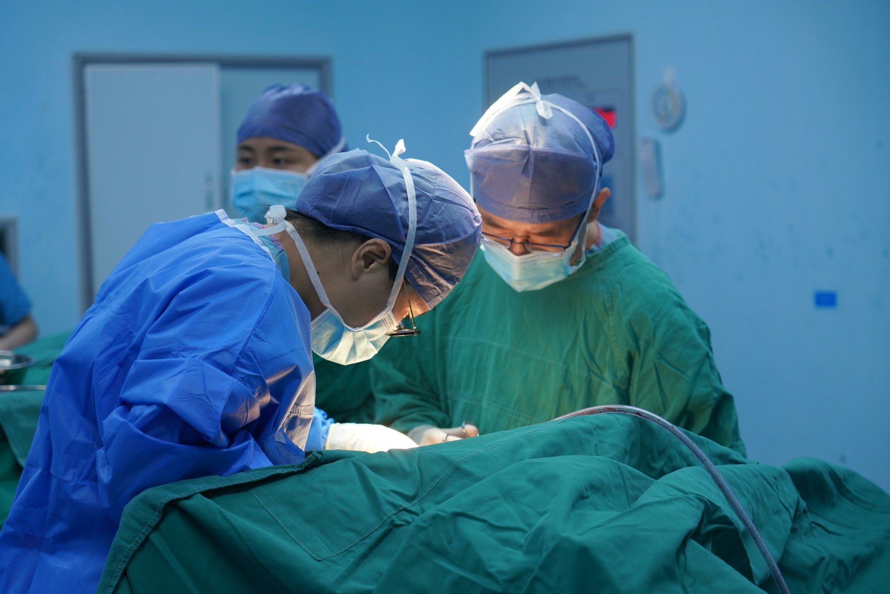 A modern surgical team in a clean operating environment